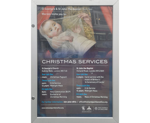 クリスマス礼拝のポスター。幼子イエスの絵が描かれている